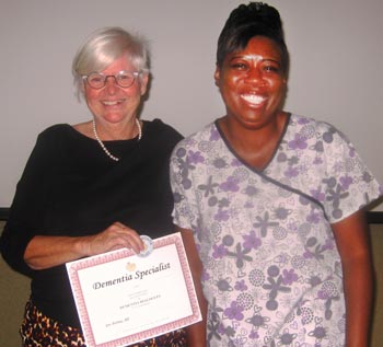 Jan Merling, left, honors Daisy Glover